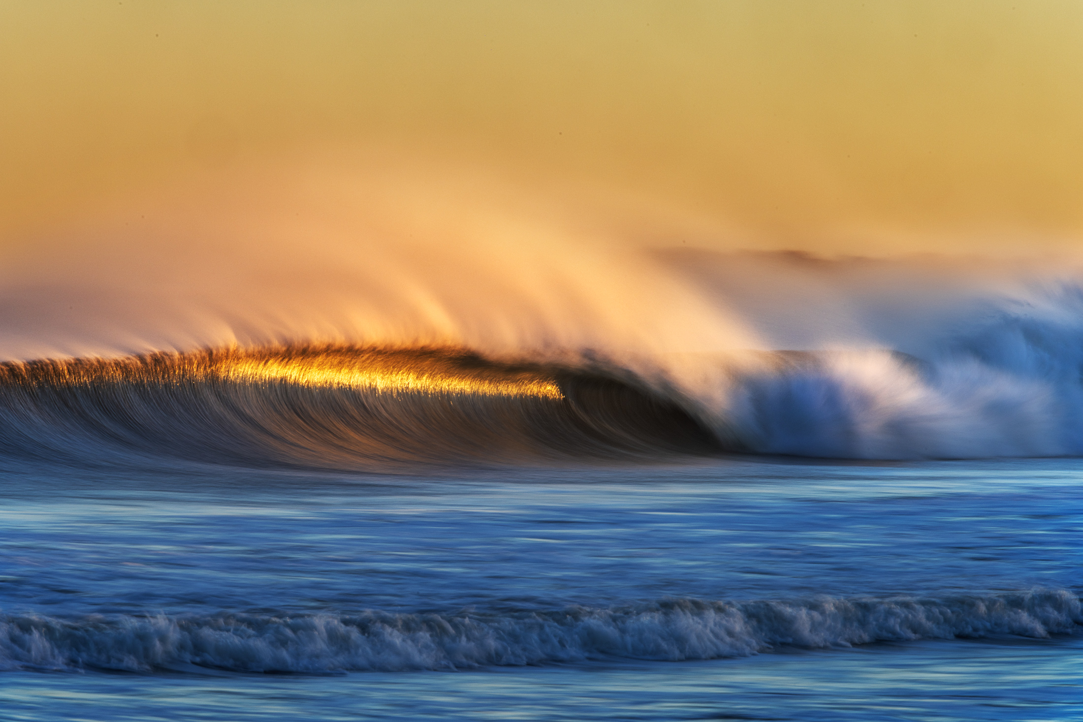 sunset wave fine art by New Hampshire based commercial outdoor lifestyle photographer Brian Nevins