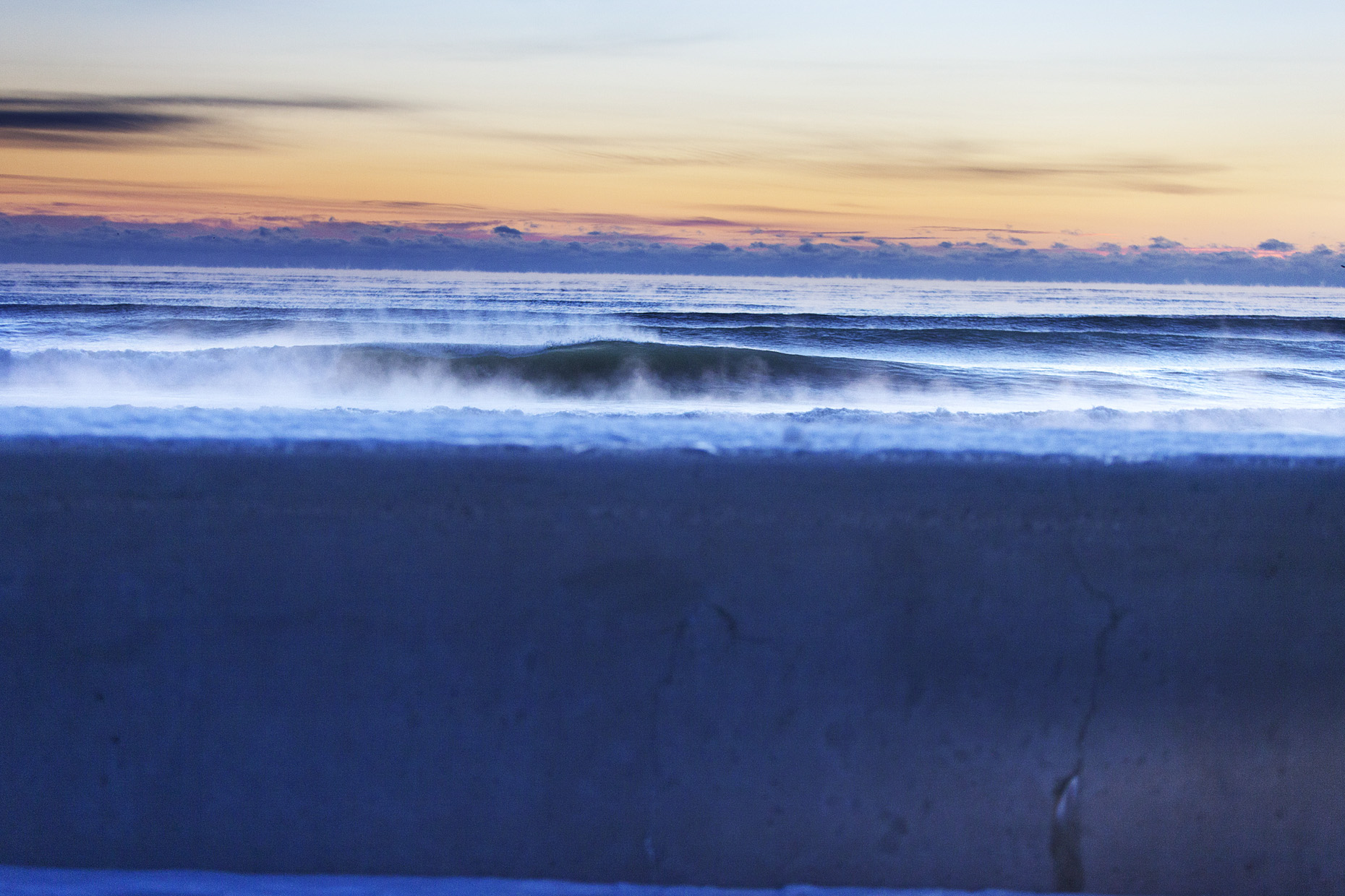 Seasmoke and frozen waves by New Hampshire based commercial outdoor lifestyle photographer Brian Nevins