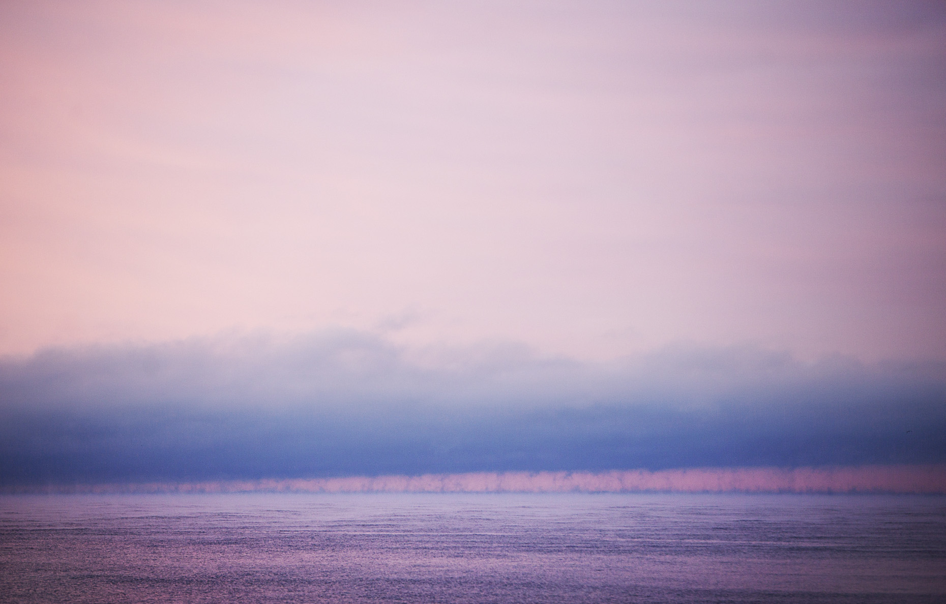 pink seasmoke and snow clouds by New Hampshire based commercial outdoor lifestyle photographer Brian Nevins