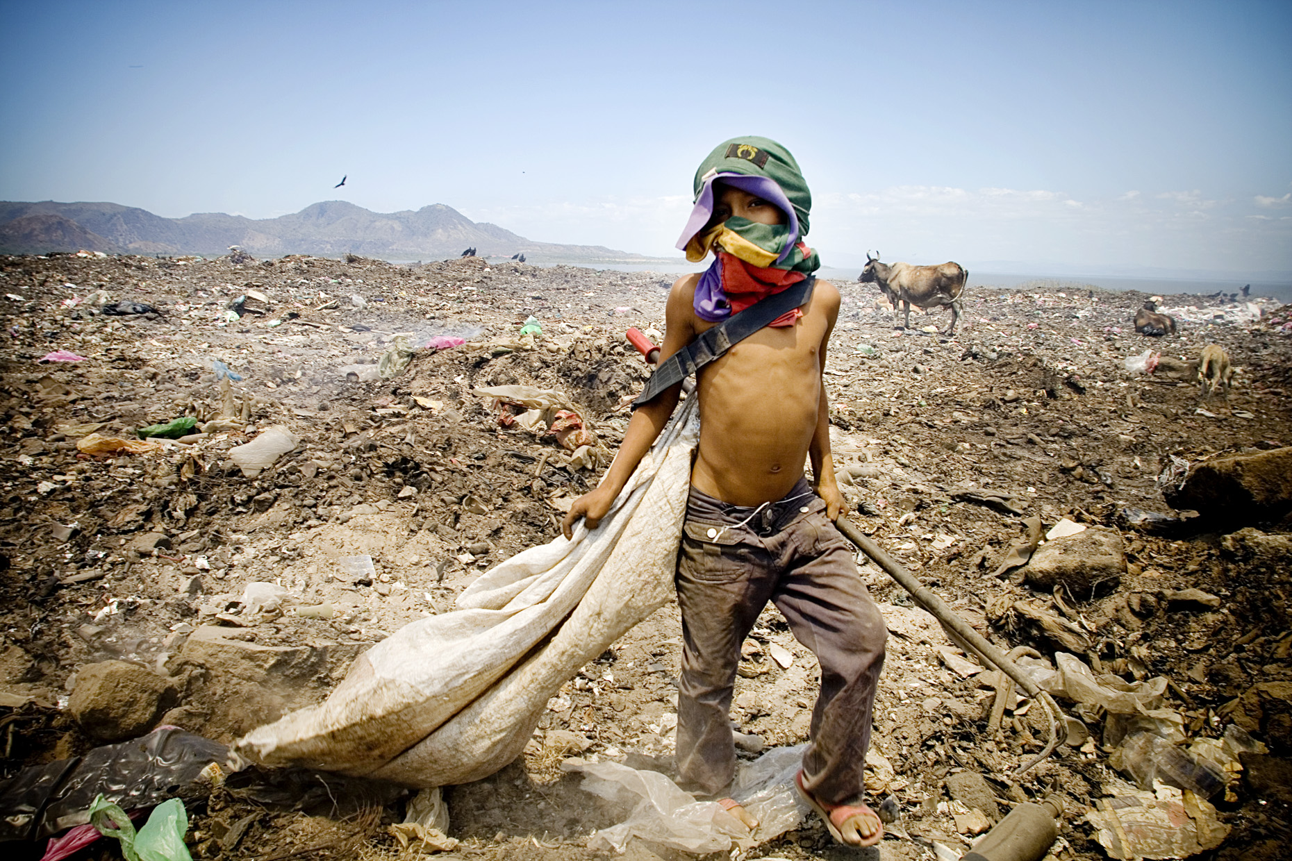 Child Worker in La Chureca  by Boston based commercial lifestyle photographer Brian Nevins